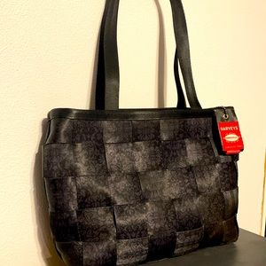 Harvey’s seatbelt purse.